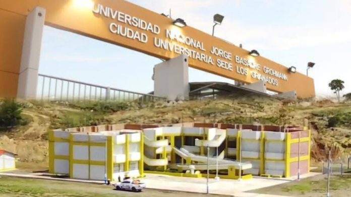 Orange archway entrance for Universidad Nacional Jorge Basadre Grohmann with a yellow-and-white construction site in front.